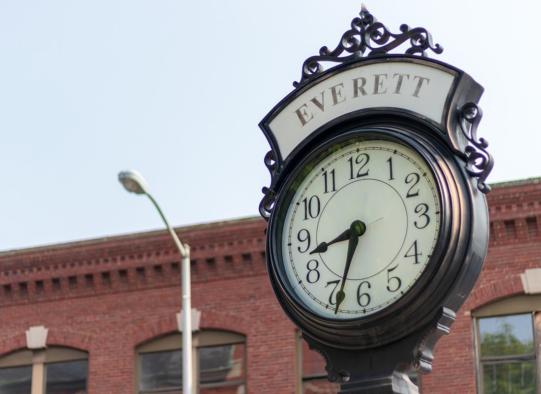 Everett, MA - Closeup View of a Traditional Clock in the Downtown Historical District of Everett Massachusetts