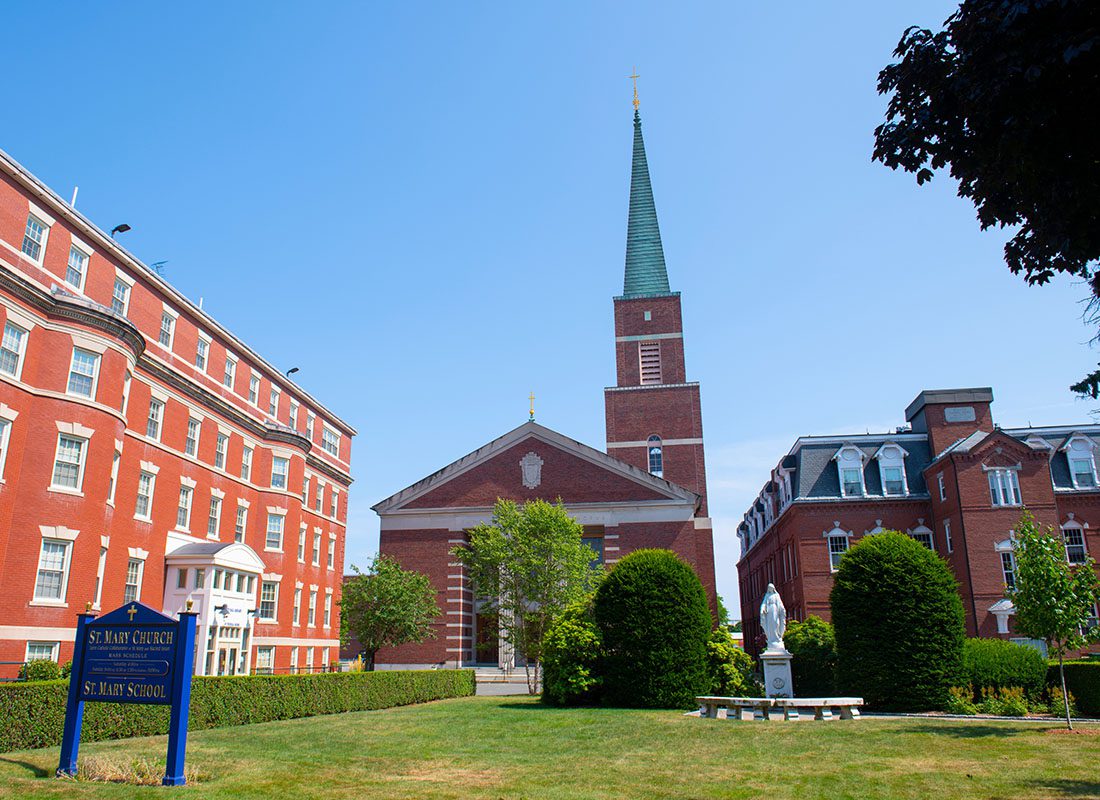 Lynn, MA - View of a Brick Church Next to Other Historical Red Brick Buildings in the Historical District of Downtown Lynn Massachusetts